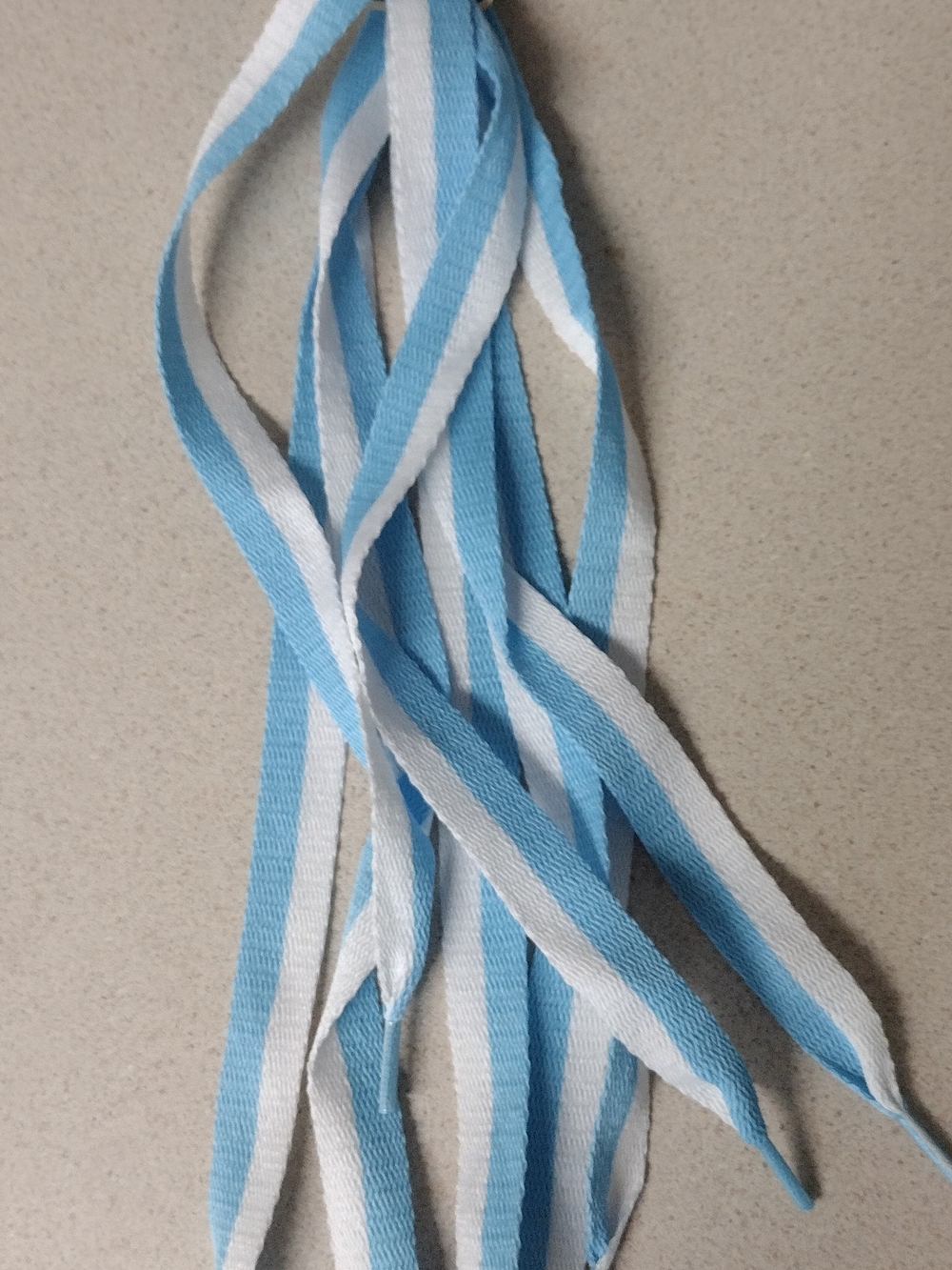 Titan Blue and White Striped Laces - $3